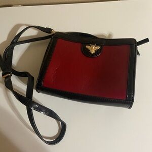 Black and Red Crossbody Bag with Gold Bee Emblem